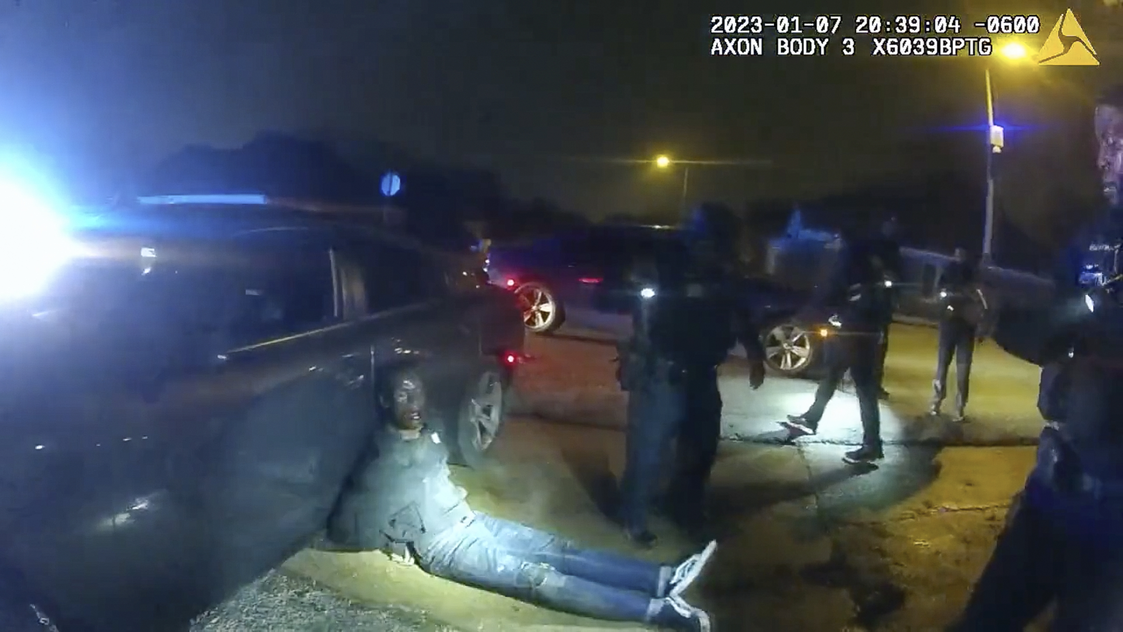In an image released by the city of Memphis, Tenn., Tyre Nichols leans against a car after a brutal attack by five Memphis officers on Jan. 7. Four of five former officers charged with murder in his death can no longer work as police in Tennessee.