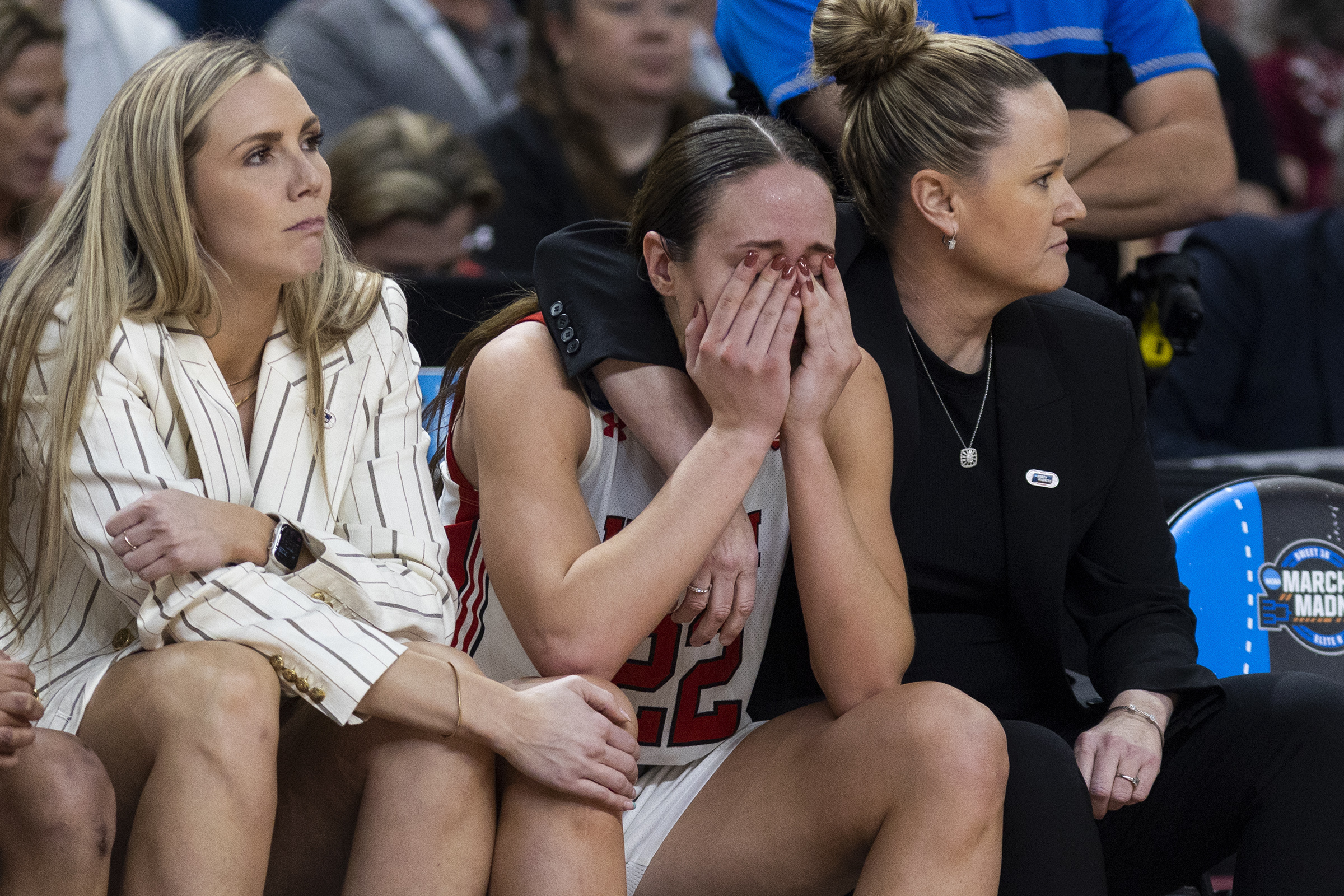 Utah's Jenna Johnson (22) is comforted by head coach Lynne Roberts, right, after missing two free throws that could have tied or put the team in the lead late in the second half against LSU during a Sweet 16 college basketball game of the NCAA Tournament in Greenville, S.C., Friday, March 24, 2023.