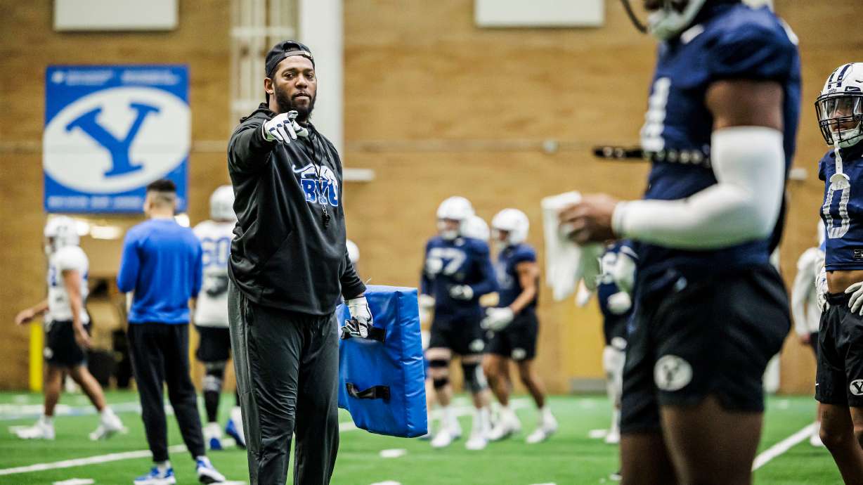 BYU cornerbacks coach Jernaro Gilford prepares his players during spring practices, Saturday, March 25, 2023, in Provo.