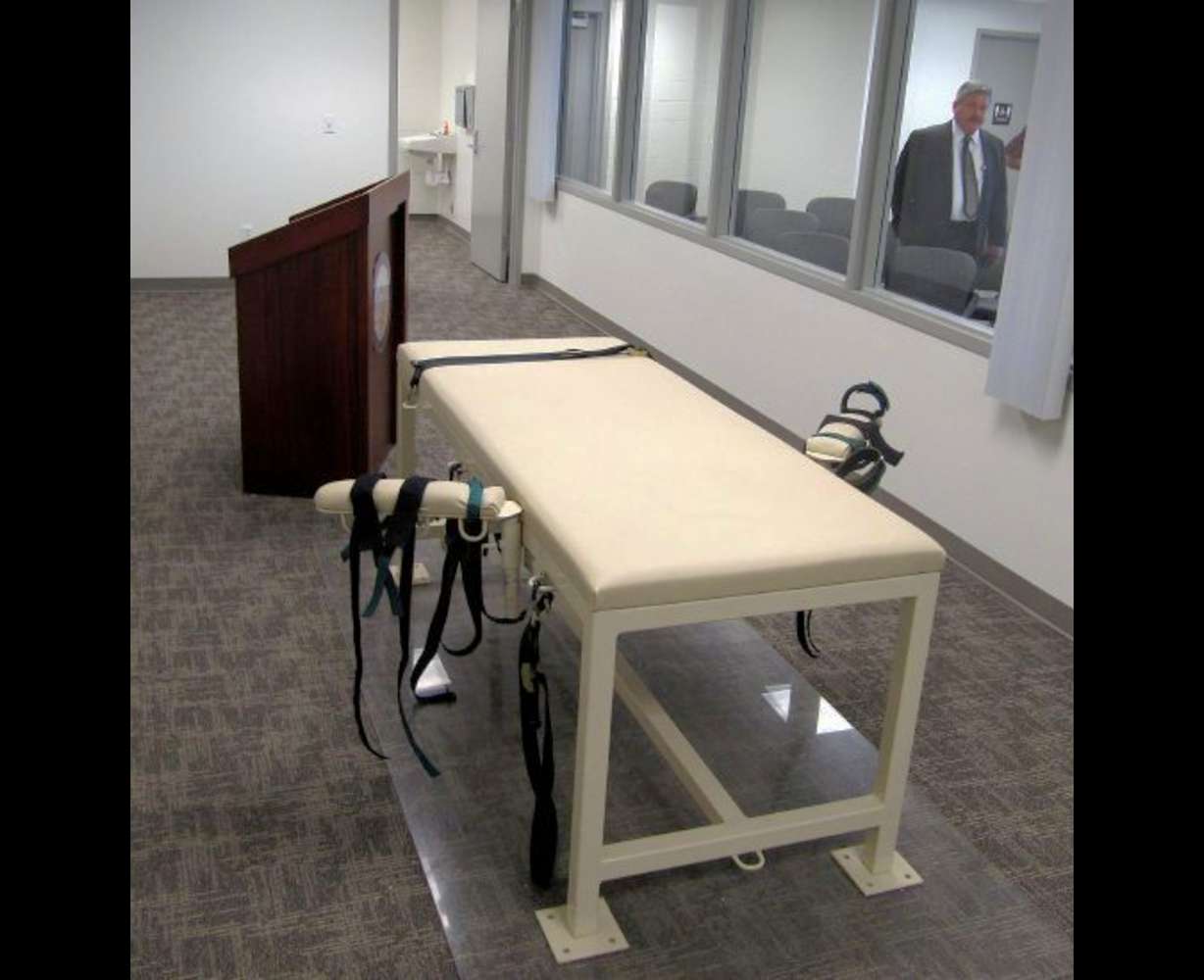 The execution chamber at the Idaho Maximum Security Institution is shown as Security Institution Warden Randy Blades looks on in Boise on Oct. 20, 2011. A bill that would allow Idaho to kill condemned inmates by firing squad was signed by the Idaho governor.