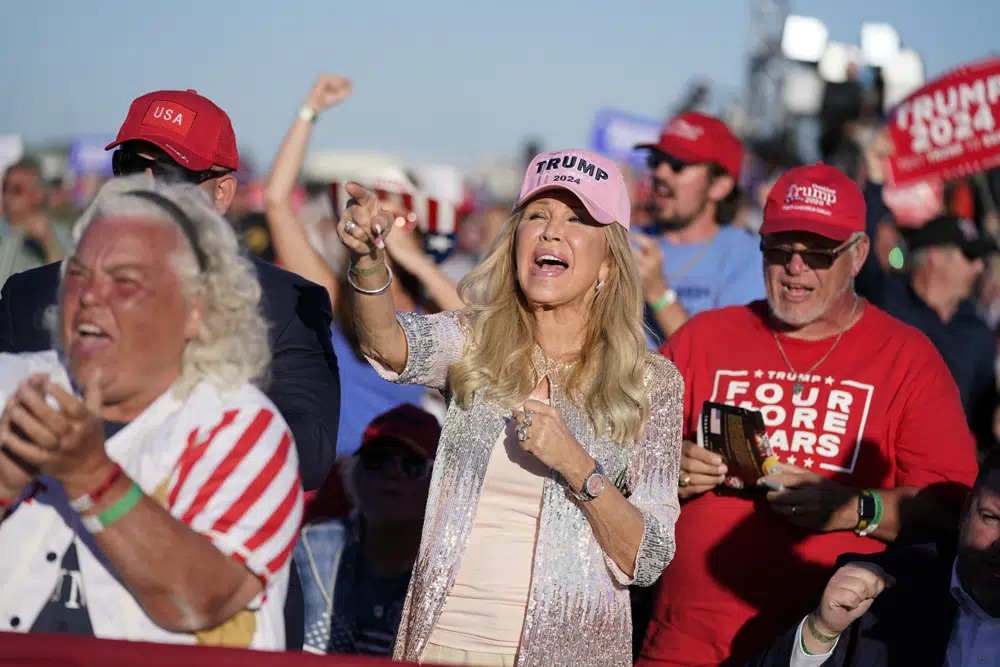 Supporters of former President Donald Trump cheer as he speaks at a campaign rally at Waco Regional Airport, Saturday in Waco, Texas.