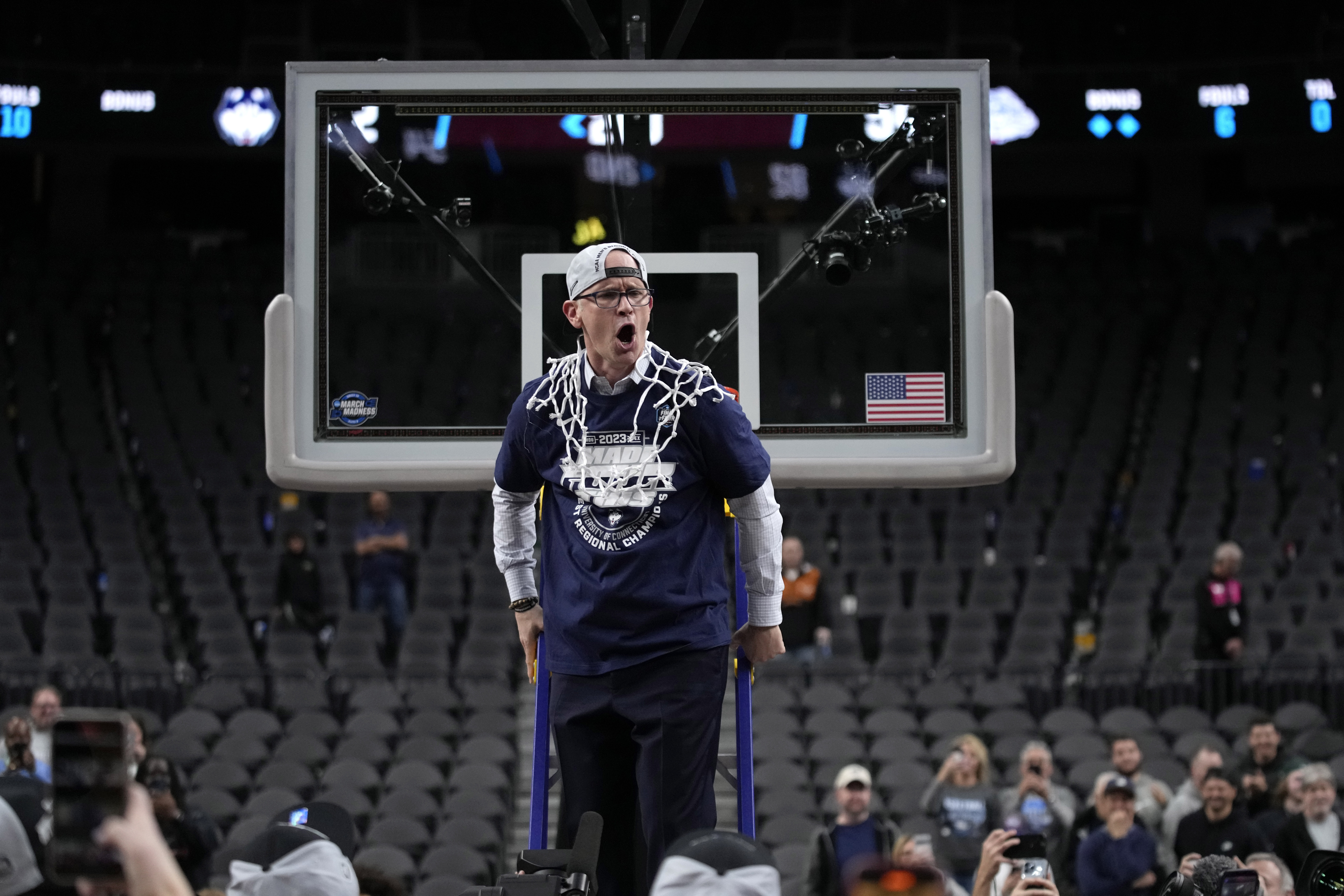 UConn head coach Dan Hurley celebrates after cutting down the netting from the 82-54 win against Gonzaga of an Elite 8 college basketball game in the West Region final of the NCAA Tournament, Saturday, March 25, 2023, in Las Vegas.