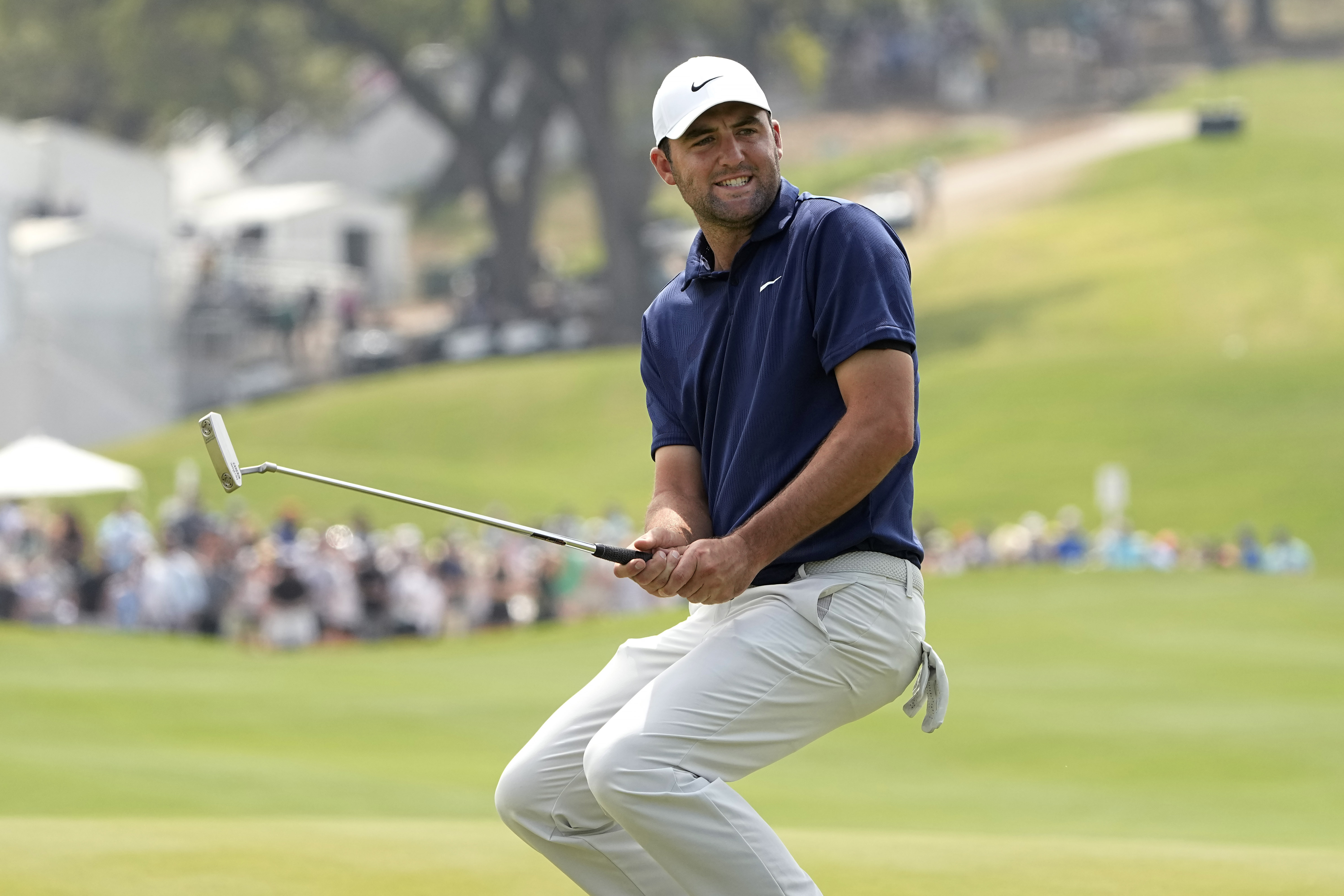 Scottie Scheffler reacts to missing a putt on a playoff hole in the semifinal round at the Dell Technologies Match Play Championship golf tournament in Austin, Texas, Sunday, March 26, 2023. Scheffler, the defending champion, lost to Sam Burns.