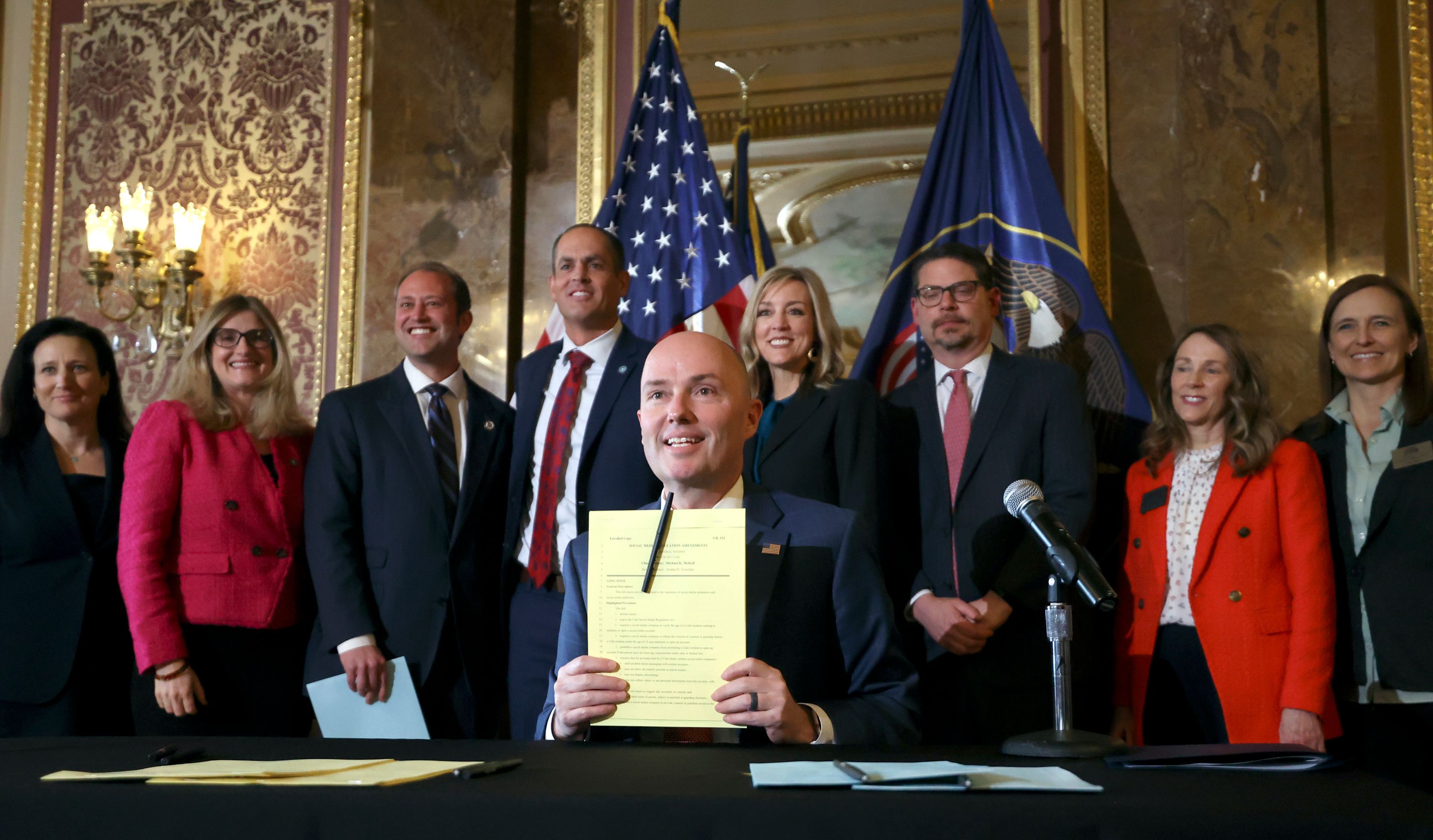 Gov. Spencer Cox poses for a photo after signing SB152, Social Media Regulation Amendments, at the Capitol in Salt Lake City on March 23. The two new state laws will restrict the use of social media by children and teens.