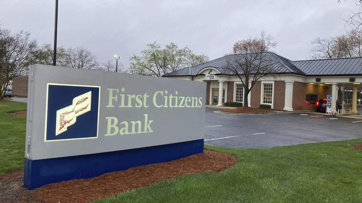 A First Citizens Bank sign is seen in Durham, N.C., on Monday. North Carolina-based First Citizens will buy Silicon Valley Bank, the tech industry-focused financial institution that collapsed earlier this month.