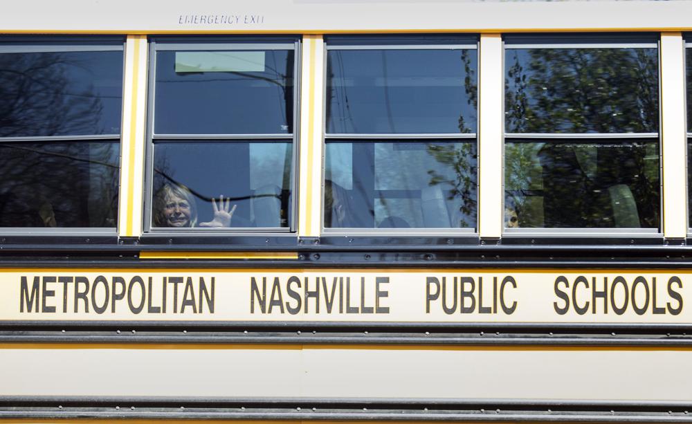 A child weeps while on the bus leaving The Covenant School following a mass shooting at the school in Nashville, Tenn., Monday.
