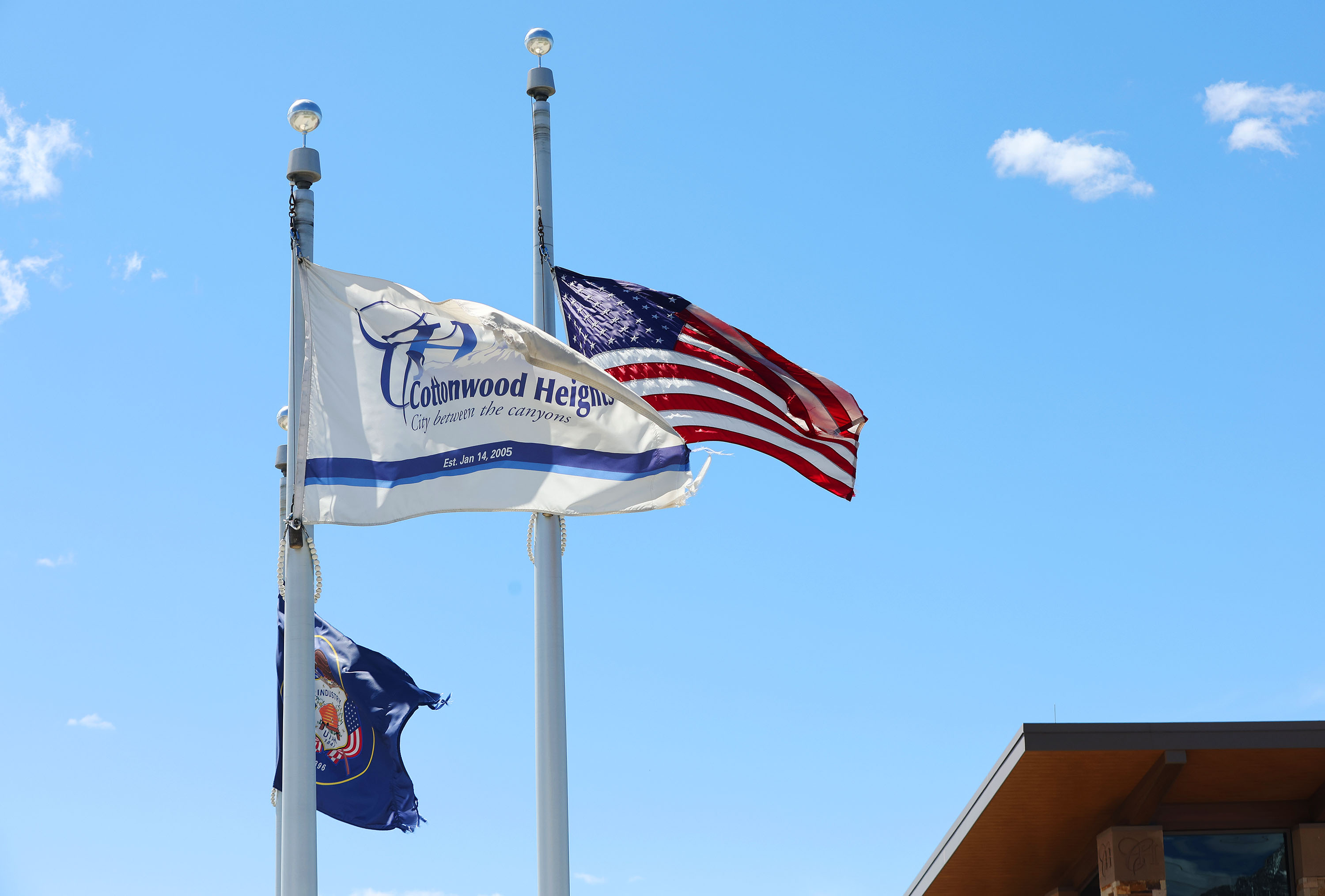 The American flag flies at half-staff at the city offices in Cottonwood Heights on Thursday, May 12, 2022. Gov. Cox ordered flags to be flown at half-staff in honor of the Nashville victims.
