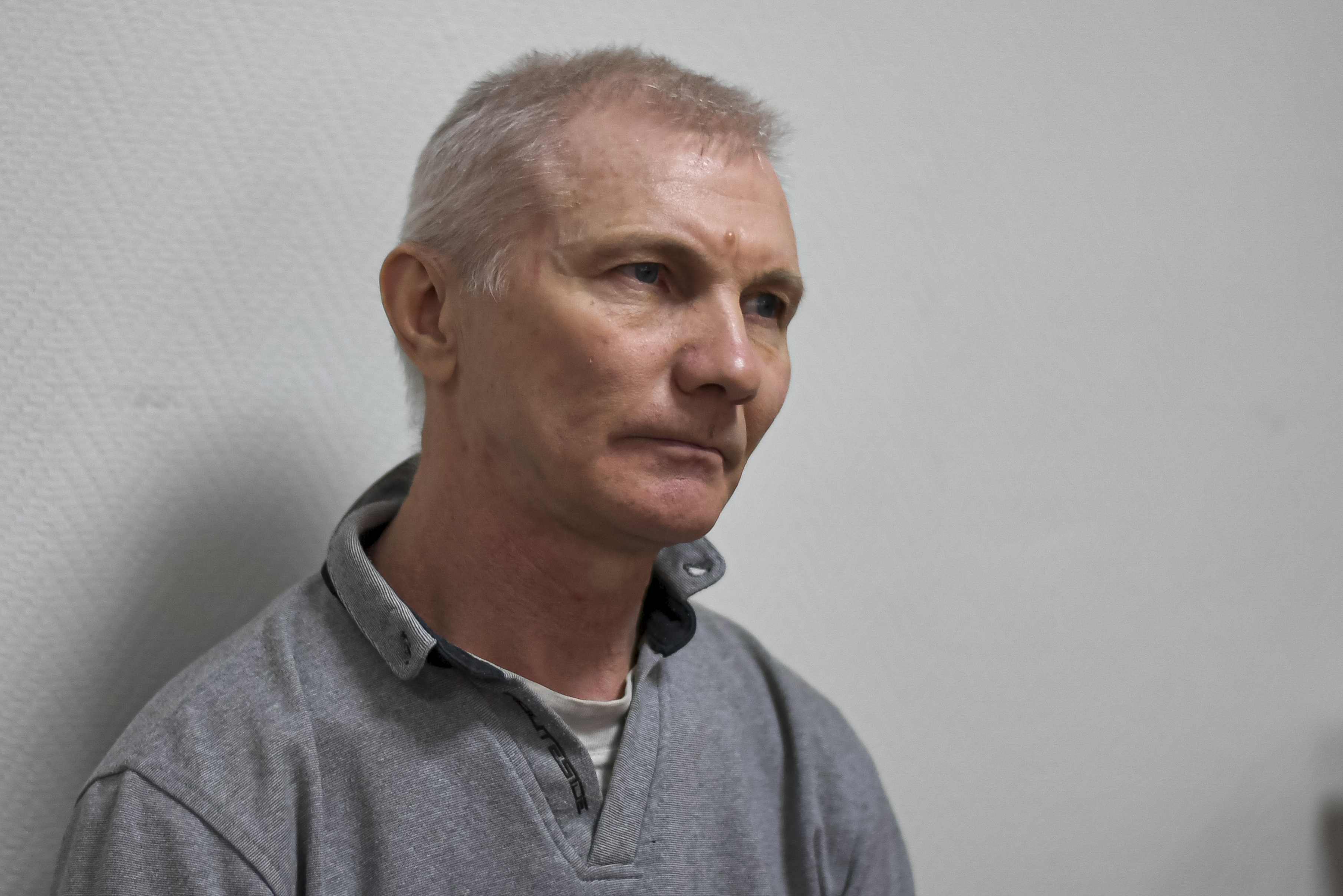Alexei Moskalyov sits in a courtroom in Yefremov, Tula region, some 186 miles south of Moscow, Russia, Monday. A court in Russia on Tuesday convicted a single father over social media posts criticizing the war in Ukraine and sentenced him to two years in prison,