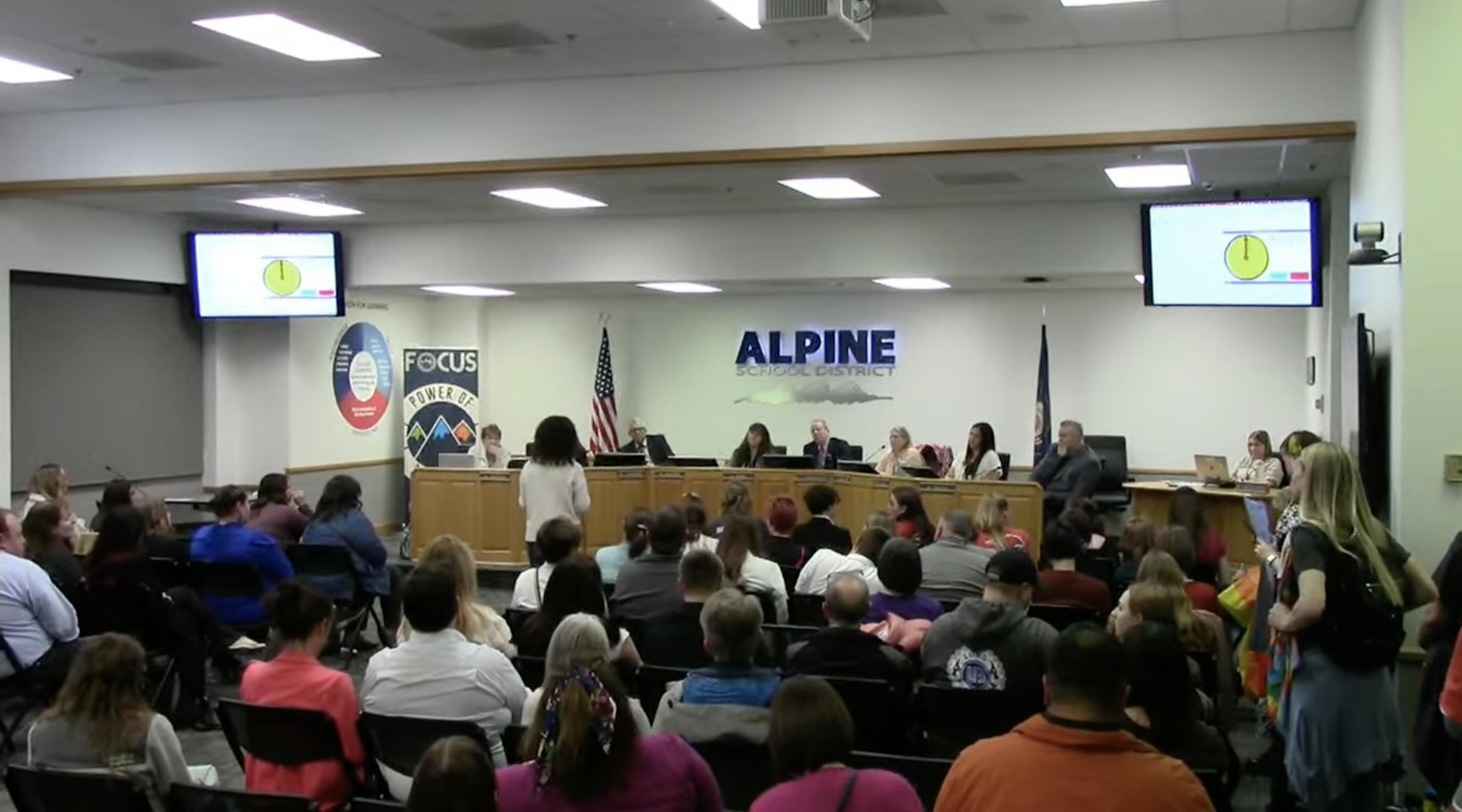 People provide public comment to the Alpine School District Board of Education during a school board meeting in American Fork on Tuesday. Five elementary schools may be closing at the end of the school year due to seismic concerns.