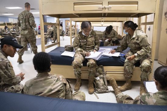 Students enlisted in the new Army prep course work together in barracks at Fort Jackson in Columbia, S.C., Aug. 26, 2022.