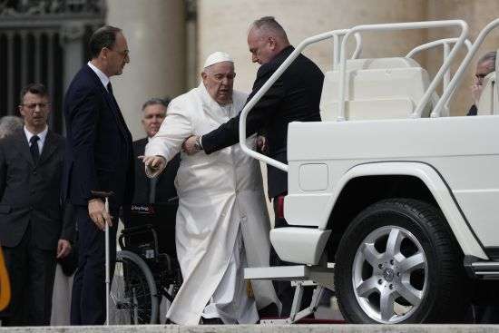 Pope Francis helped to get on his car at the end of weekly general audience in St. Peter's Square, at the Vatican, Wednesday. Pope Francis went to a Rome hospital on Wednesday for some previously scheduled tests, slipping out of the Vatican after his general audience and before the busy start of Holy Week this Sunday.