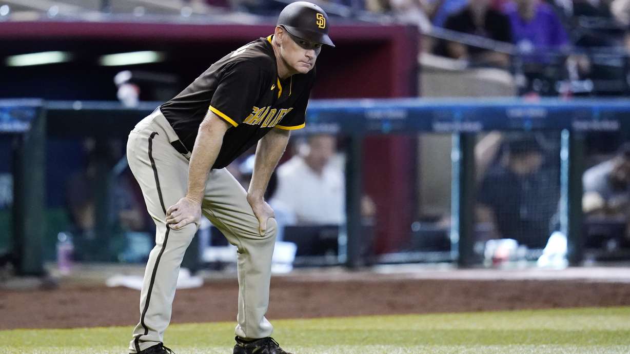 FILE - San Diego Padres third base coach Matt Williams pauses on the field during the seventh inning of a baseball game against the Arizona Diamondbacks in Phoenix, Sunday, Sept. 18, 2022. The San Diego Padres third base has colon cancer and will have surgery on Friday, March 31, 2023.