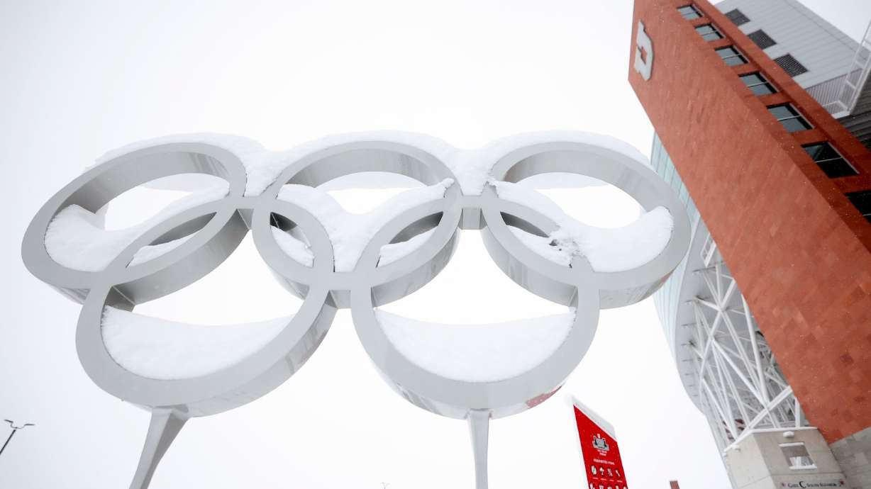 The Olympic rings are pictured covered in snow at the Olympic and Paralympic Cauldron Plaza in Salt Lake City, on Feb. 22. There are more potential hosts for future winter games, the IOC said.