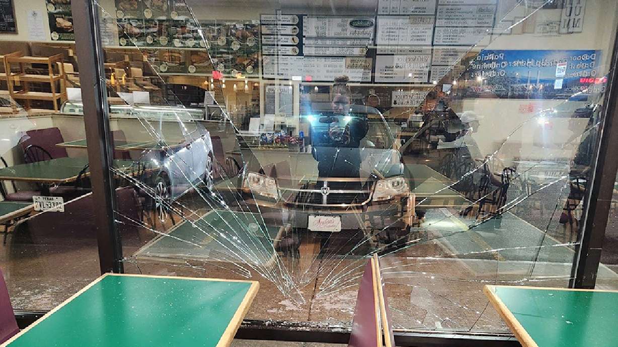 Damage from a vehicle crashing into Geraldine’s Bake Shoppe & Deli on Wednesday. The Idaho bake shop closed its lobby to customers after a man drove his car into one of the windows, shattered glass and yelled that people would die.