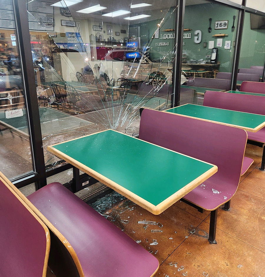 This shows the damage done from Wednesday’s incident at Geraldine’s Bake Shoppe & Deli. A local bake shop closed its lobby to customers after a man drove his car into one of the windows, shattered glass and yelled that people would die.