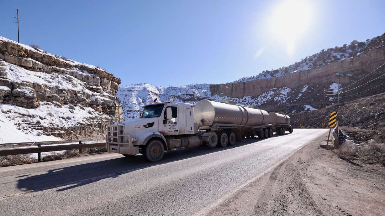 A tanker truck makes its way down SR 191 and Indian Canyon near Martin, Wednesday. A planned 88-mile railroad line that would traverse eastern Utah and connect with the National Rail Network is once again sparking controversy.