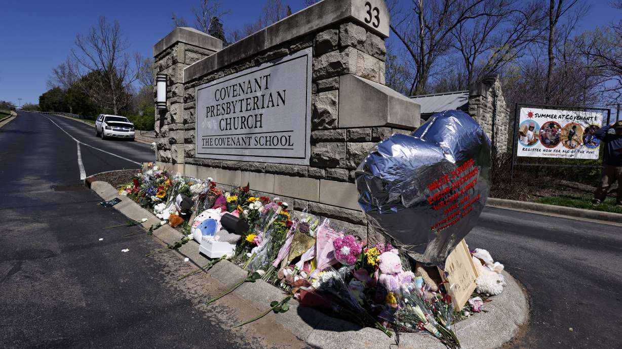 A balloon with names of the victims is seen at a memorial at the entrance to The Covenant School on Wednesday, in Nashville, Tennessee.