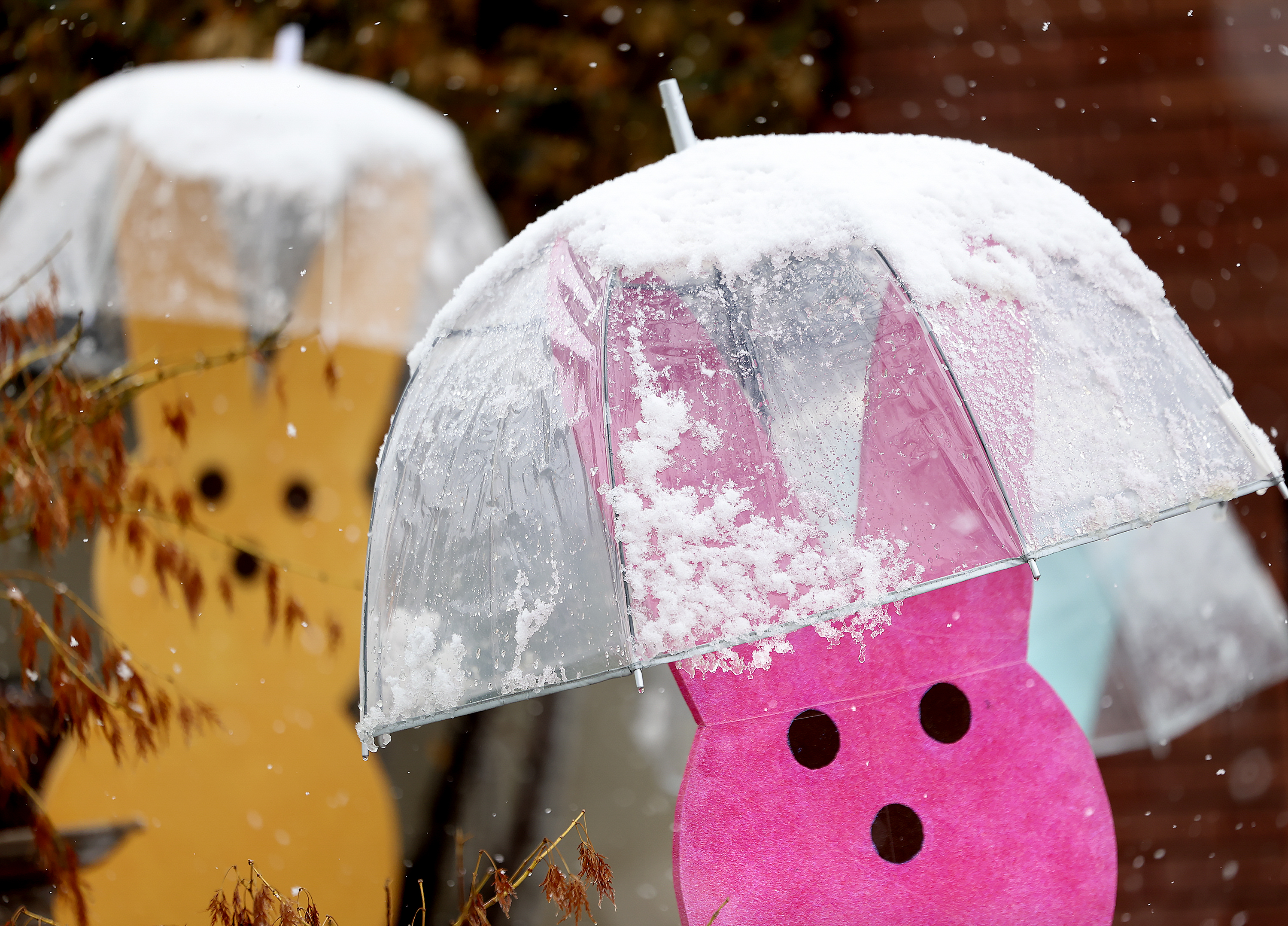 Easter decorations receive a new coating of snow in Salt Lake City on Thursday. The National Weather Service on Thursday issued a winter storm warning for the northern and south halves of the Wasatch Mountains.