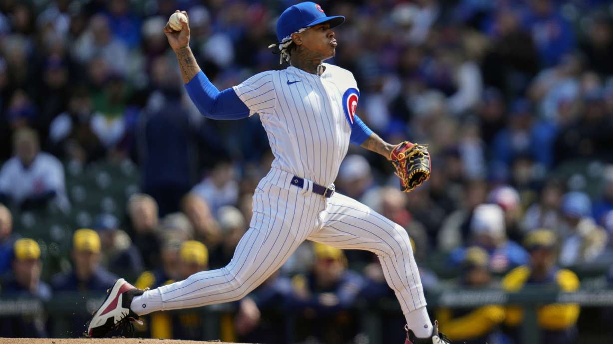 Chicago Cubs starting pitcher Marcus Stroman throws during the first inning of a baseball game against the Milwaukee Brewers Thursday, March 30, 2023, in Chicago.