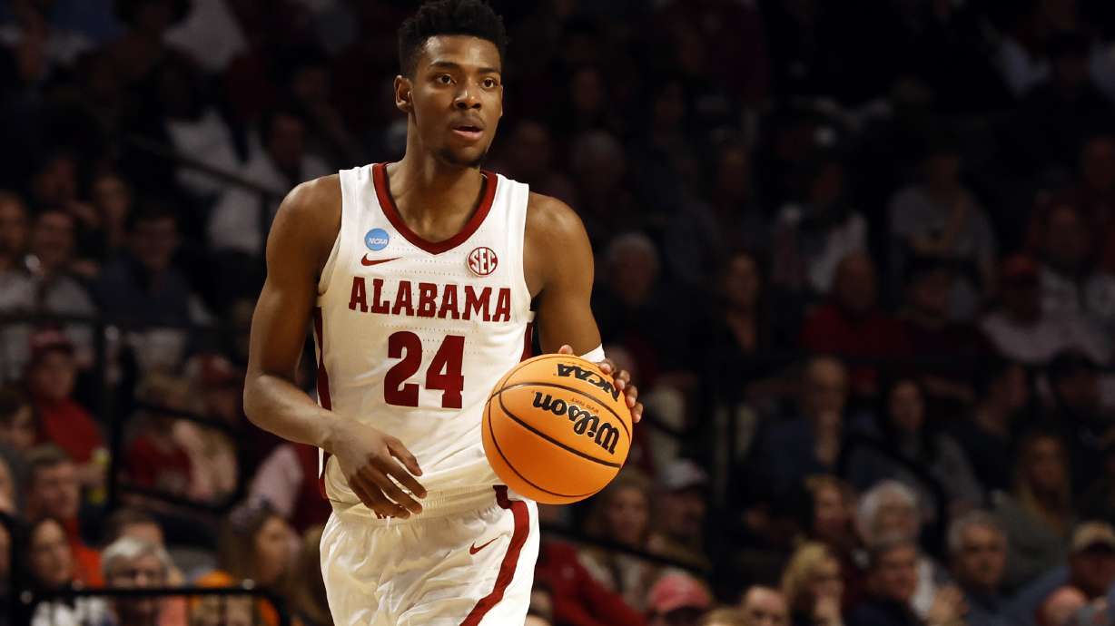 Alabama forward Brandon Miller dribbles in the first half of a second-round college basketball game against Maryland in the NCAA Tournament in Birmingham, Ala., Saturday, March 18, 2023.