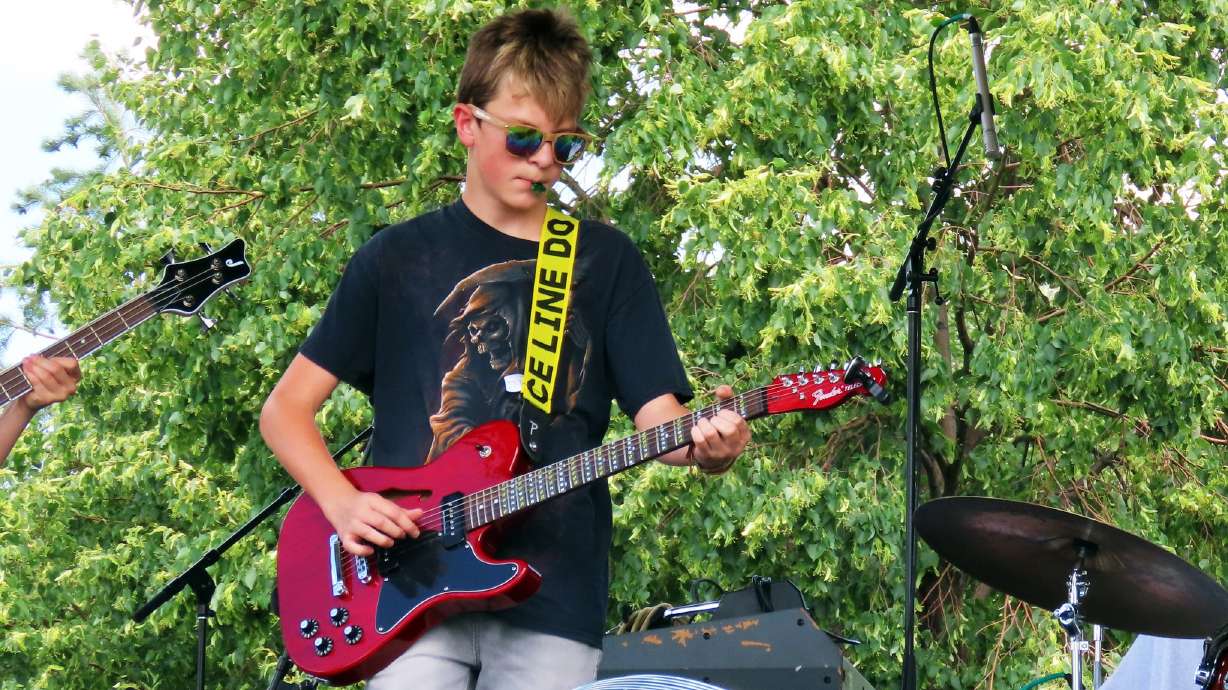 UOS middle school guitarist focuses on his craft while earning high school credits