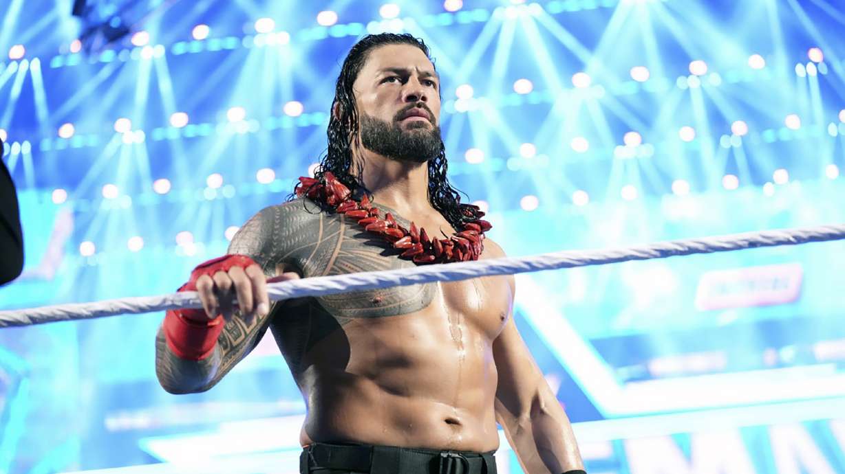 Roman Reigns enters the ring to face Brock Lesnar during WrestleMania 38 in Arlington Texas, April 3, 2022. Reigns and Cody Rhodes will be in the main event of WrestleMania 39 on April 2, 2023, in Los Angeles.