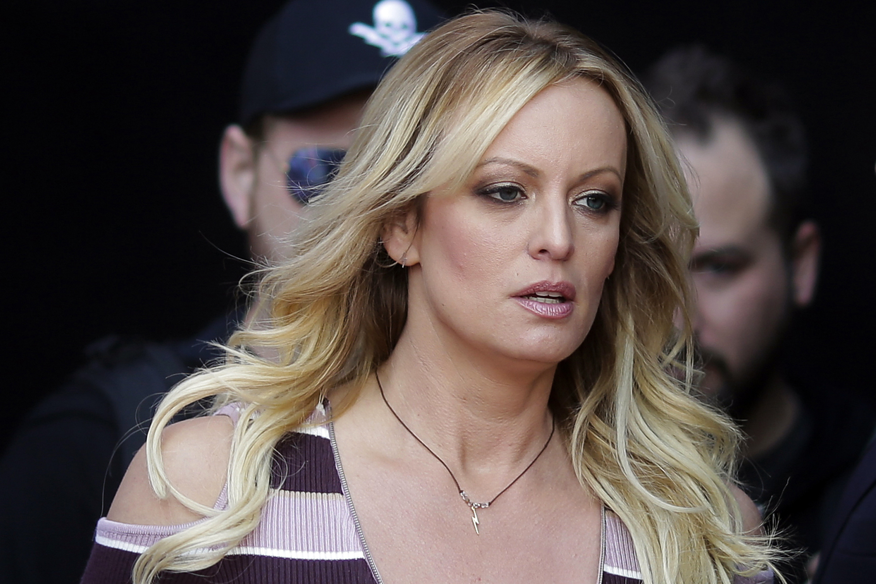 Adult film actress Stormy Daniels arrives for the opening of the adult entertainment fair Venus in Berlin, on Oct. 11, 2018. Daniels' lawyer said she met March 15, with prosecutors who are investigating hush money paid to her on behalf of former President Donald Trump.