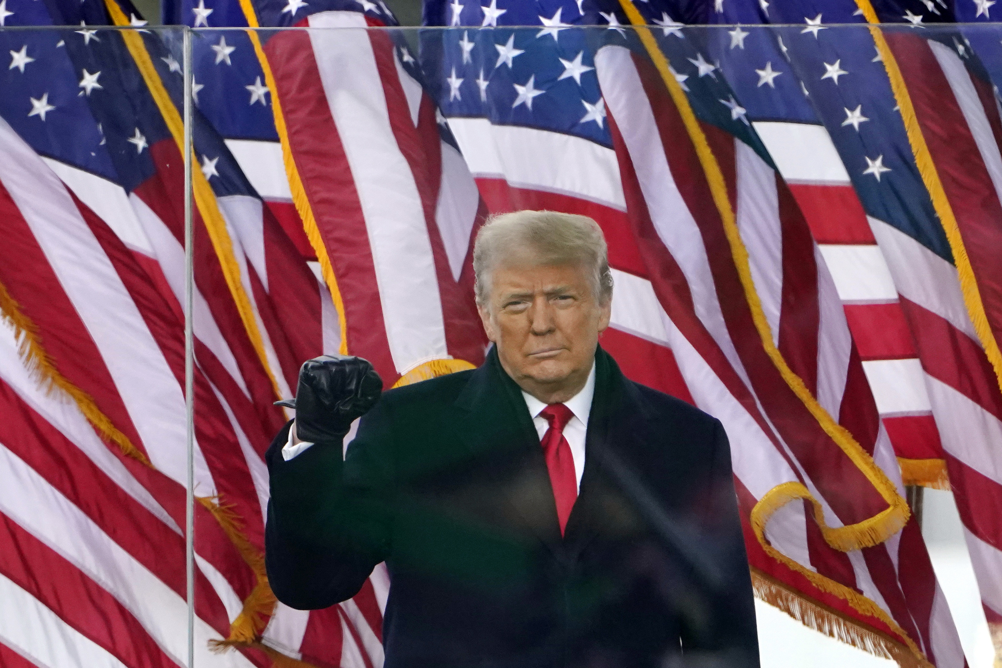 President Donald Trump gestures as he arrives to speak at a rally in Washington, Jan. 6, 2021. A lawyer for Trump said Thursday that he has been told that the former president has been indicted in New York on charges involving payments made during the 2016 presidential campaign to silence claims of an extramarital sexual encounter.