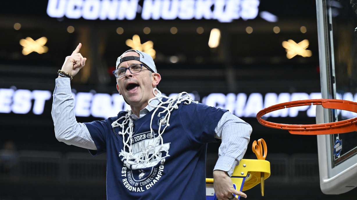 UConn head coach Dan Hurley celebrates after cutting down the netting from the 82-54 win against Gonzaga of an Elite 8 college basketball game in the West Region final of the NCAA Tournament, Saturday, March 25, 2023, in Las Vegas.