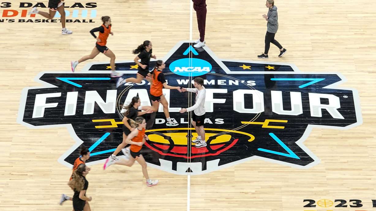 Virginia Tech players run a drill during a practice session for an NCAA Women's Final Four semifinals basketball game Thursday, March 30, 2023, in Dallas.
