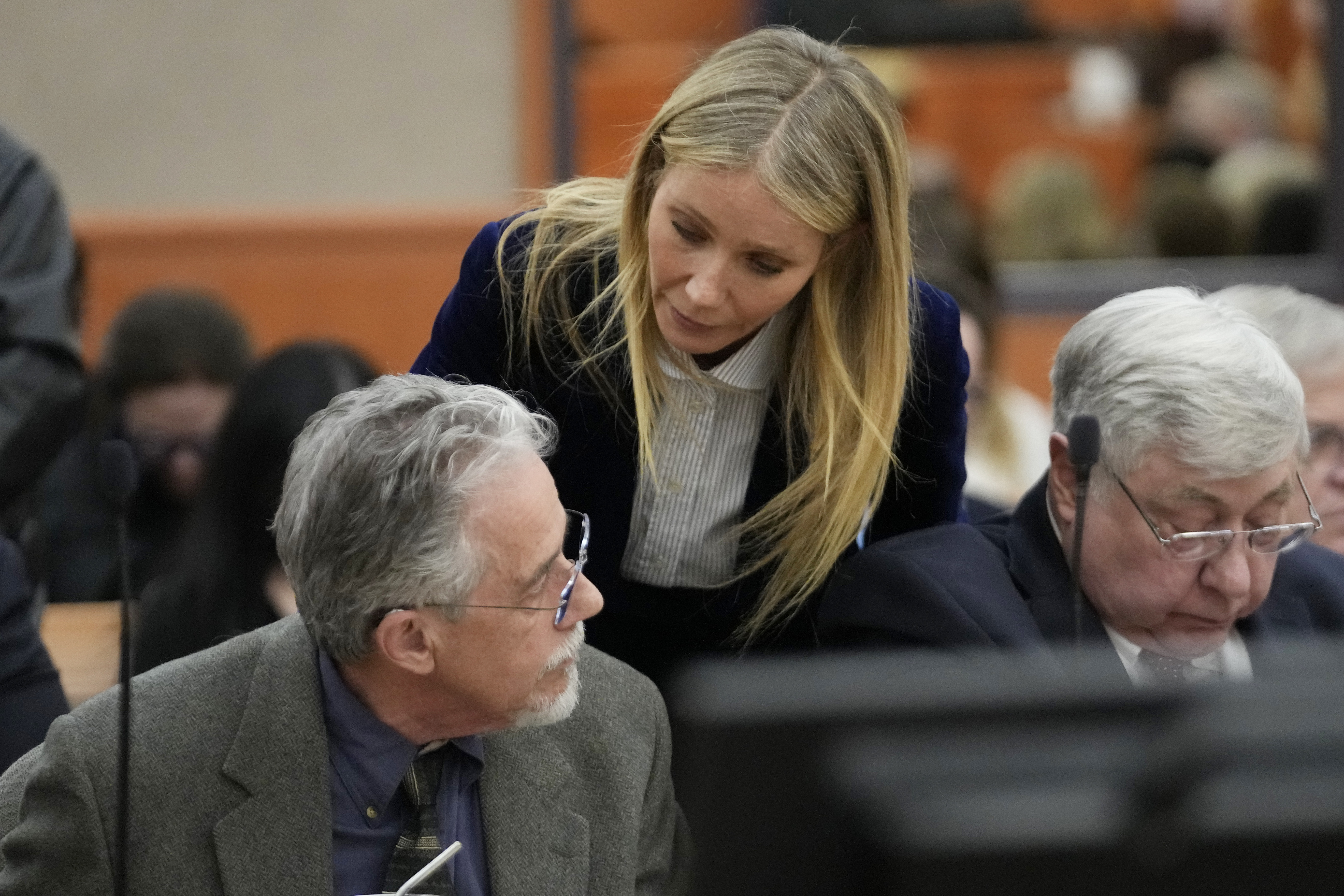 Gwyneth Paltrow speaks with retired optometrist Terry Sanderson, left, as she walks out of the courtroom following the reading of the verdict in their lawsuit trial, Thursday in Park City. Paltrow won her court battle over a 2016 ski collision at a posh Utah ski resort after a jury decided Thursday that the movie star wasn’t at fault for the crash.