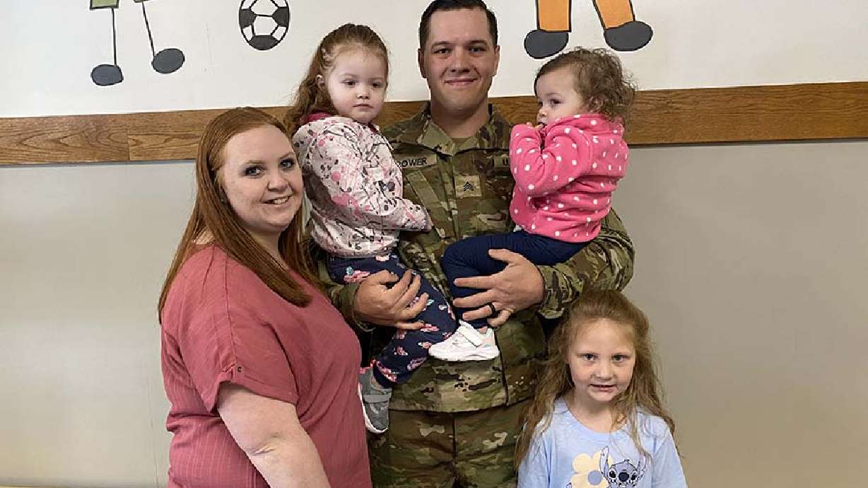 Sgt. Jory Brower with his wife, Jordyn, and their children – Payton, Paisley and Parker on March 31. Jory had been deployed overseas with the U.S. Army since September and surprised his 6-year-old daughter at school Friday as she and her classmates were playing Heads Up, Seven Up.