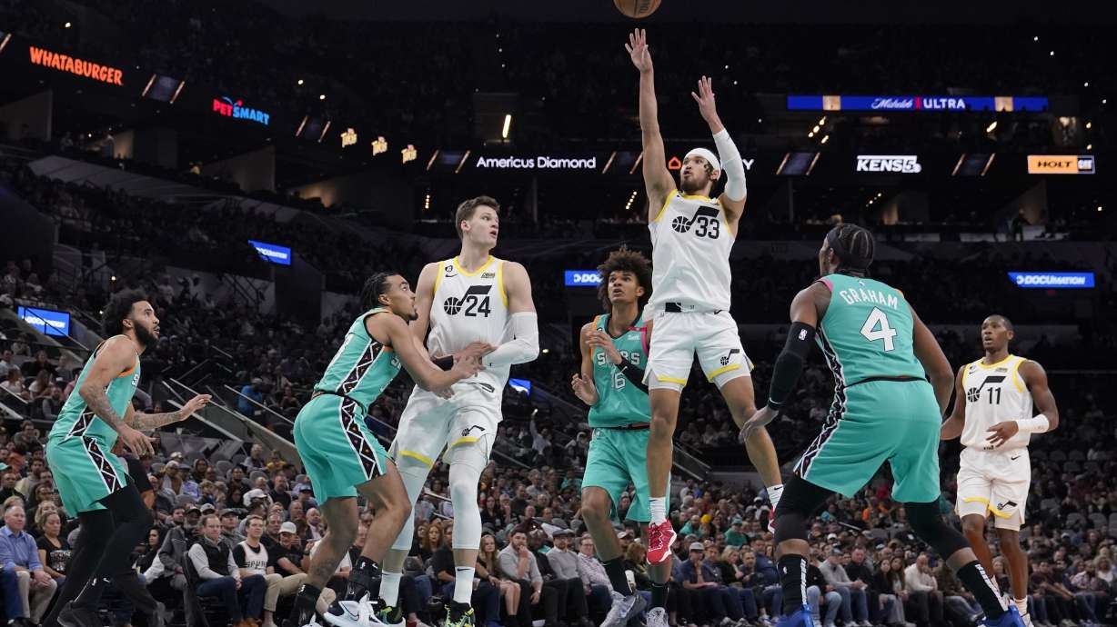 Utah Jazz guard Johnny Juzang (33) shoots against the San Antonio Spurs during the second half of an NBA basketball game in San Antonio, Wednesday, March 29, 2023.