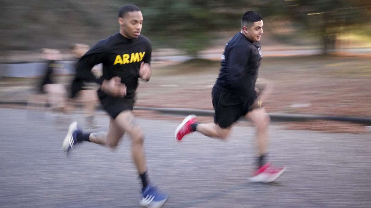 Army Staff Sgt. Daniel Murillo, right, runs up hill as part of his physical training at Ft. Bragg on Jan. 18, in Fayetteville, North Carolina. Obesity in the U.S. military surged during the pandemic, new research shows.