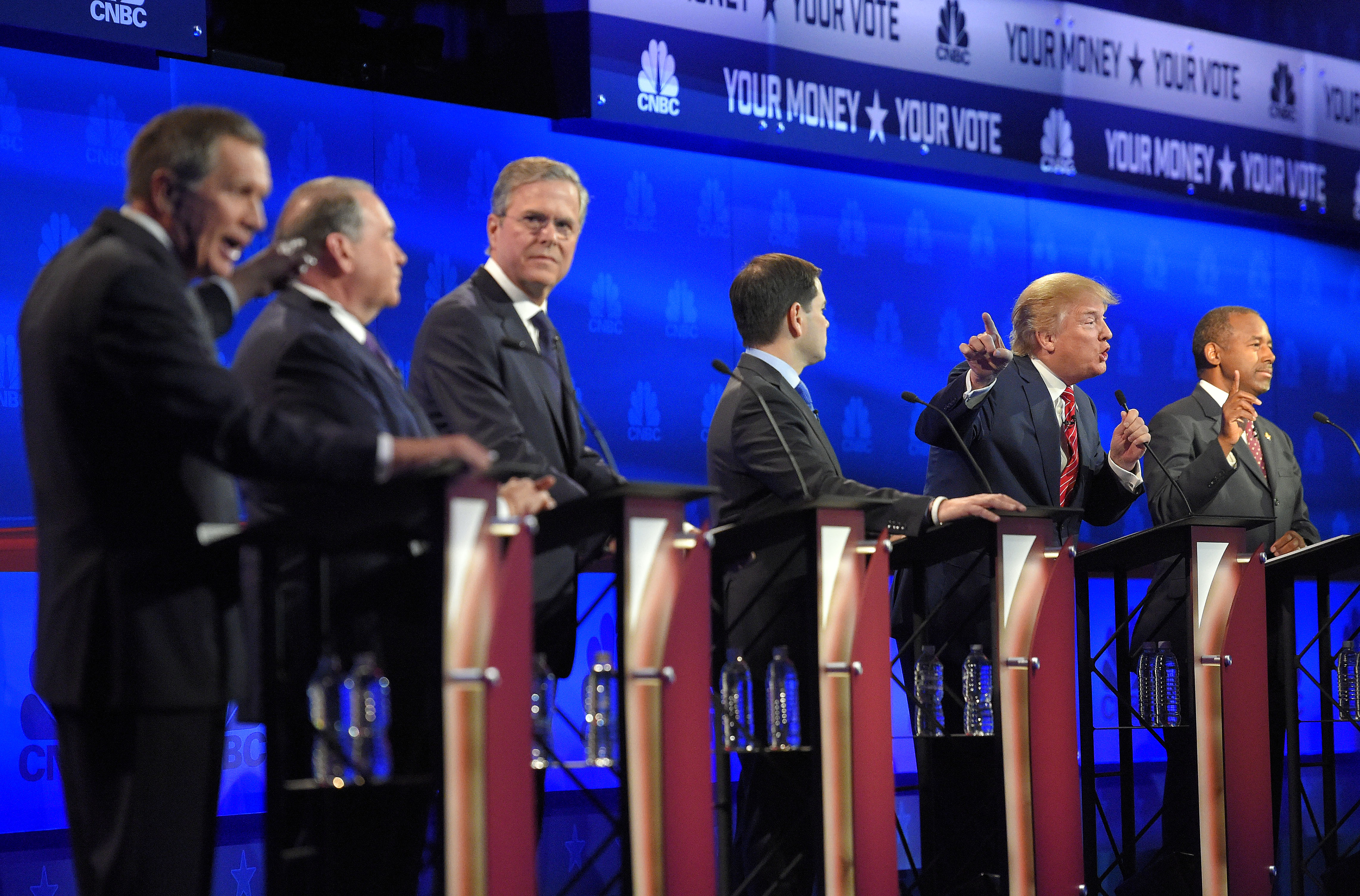 From left, Ohio Gov. John Kasich, former Arkansas Gov. Mike Huckabee, former Florida Gov. Jeb Bush, Sen. Marco Rubio, R-Fla., Donald Trump and Ben Carson, in Boulder, Colorado, Oct. 28, 2015. Republicans are still trying to figure out how to run against Trump. 
