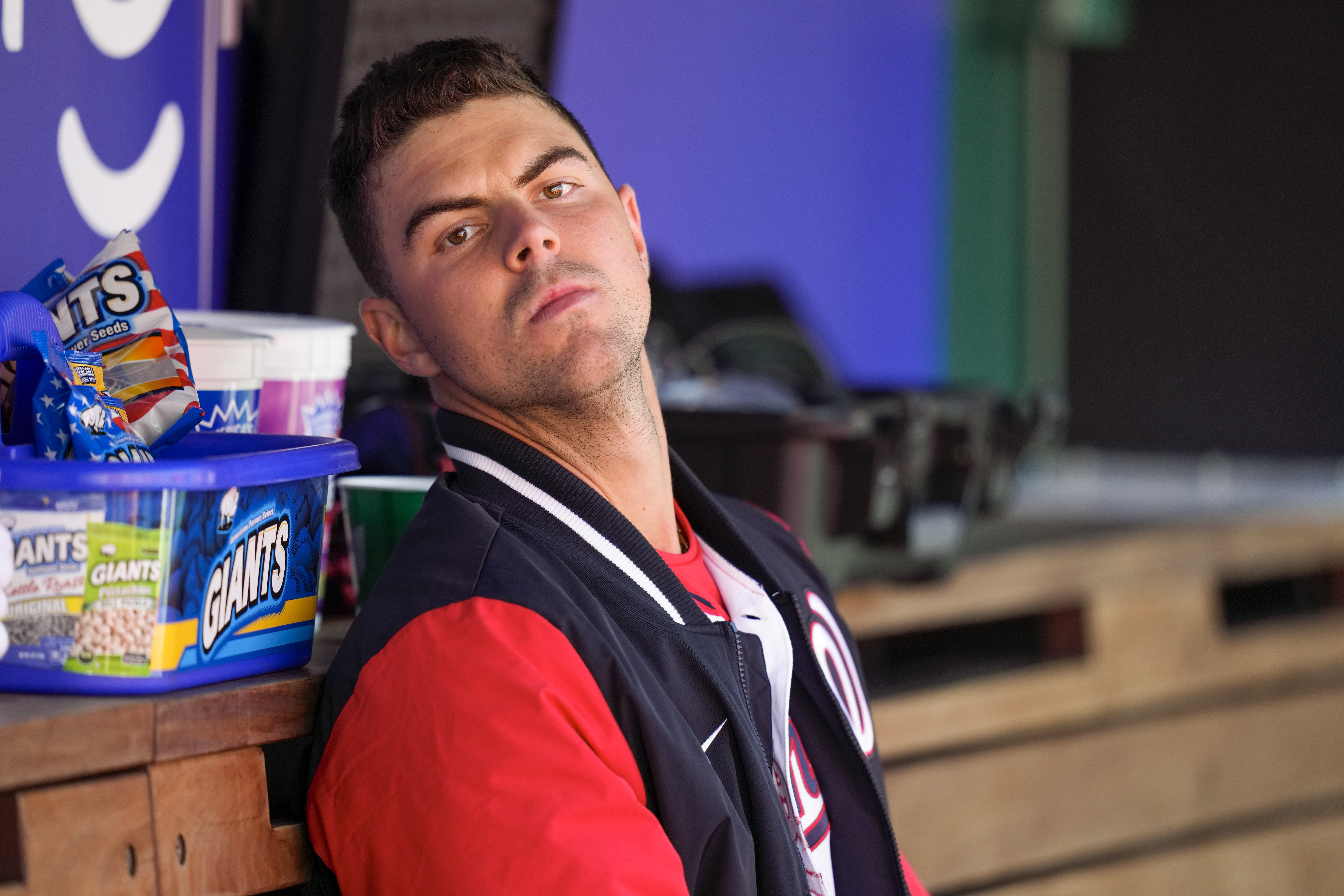 Washington Nationals starting pitcher MacKenzie Gore sits in the dugout during the fifth inning of a baseball game against the Atlanta Braves at Nationals Park, Sunday, April 2, 2023, in Washington. 
