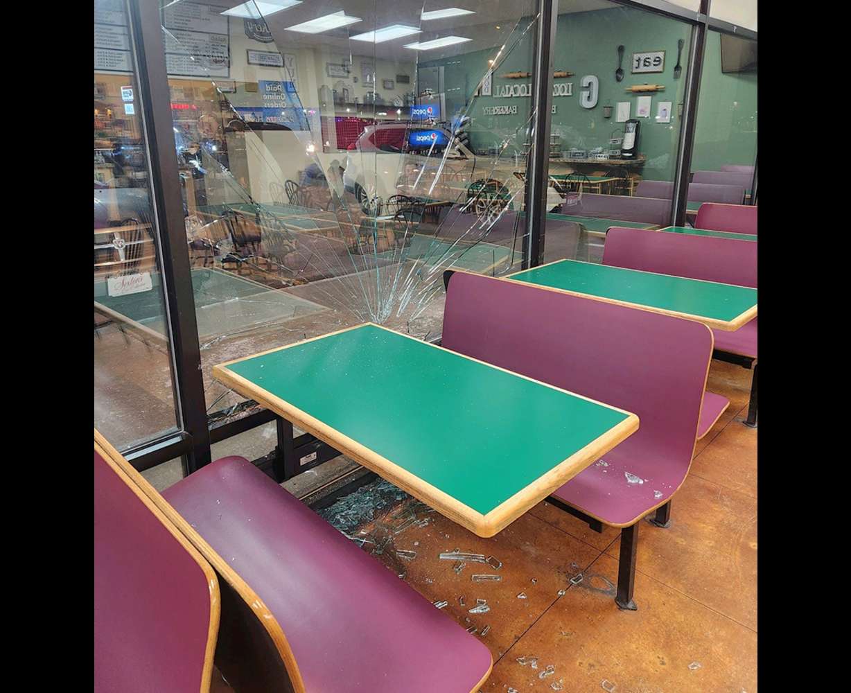 Damage is seen at Geraldine’s Bake Shoppe & Deli in Ammon, Idaho, on March 29.