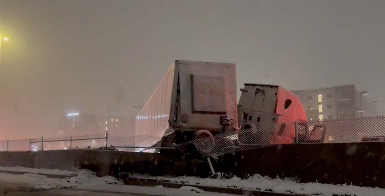 A semitruck jackknifed near Draper Monday morning, April 3 as snow moved in across parts of the Wasatch Front.
