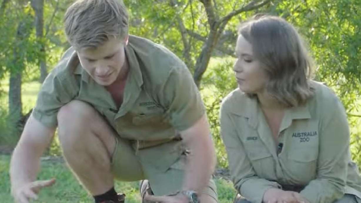 Robert and Bindi Irwin describe a blue-tongued lizard in a blooper reel for the Australia Zoo.