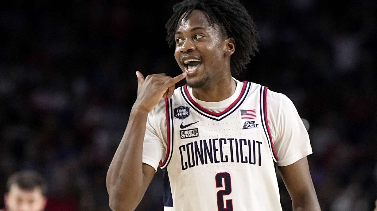 Connecticut guard Tristen Newton celebrates after scoring against San Diego State during the first half of the men's national championship college basketball game in the NCAA Tournament on Monday, April 3, 2023, in Houston.