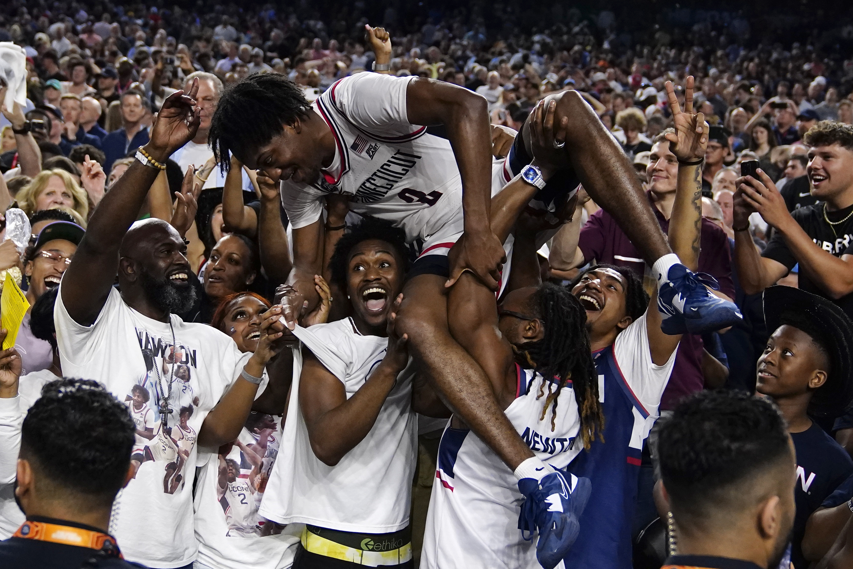 Connecticut guard Tristen Newton celebrates after their win against San Diego State during the men's national championship college basketball game in the NCAA Tournament on Monday, April 3, 2023, in Houston.