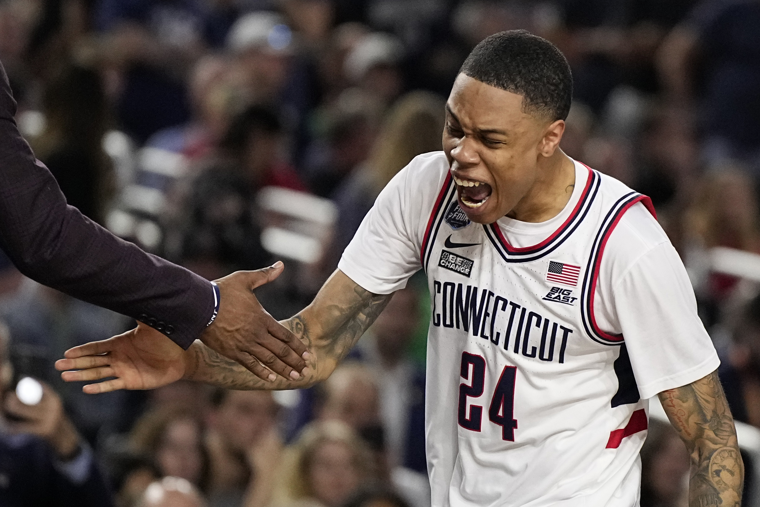 Connecticut guard Jordan Hawkins celebrates during the second half of the men's national championship college basketball game against San Diego State in the NCAA Tournament on Monday, April 3, 2023, in Houston. 