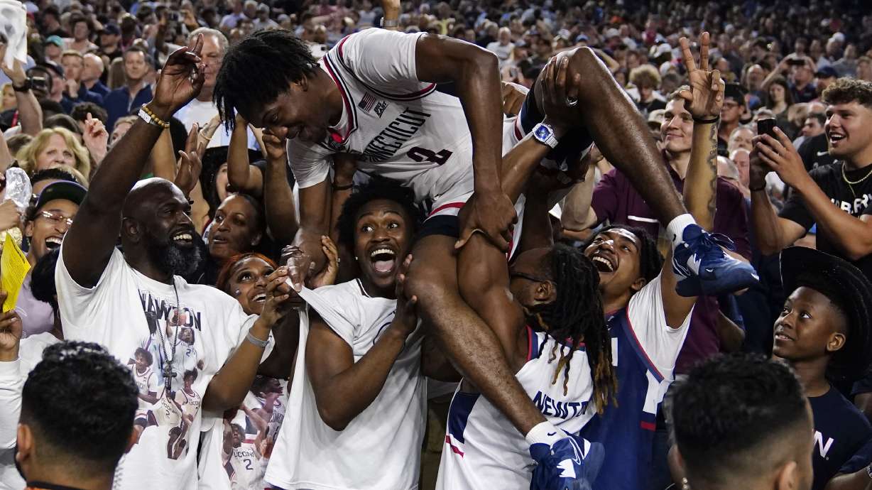 Connecticut guard Tristen Newton celebrates after their win against San Diego State during the men's national championship college basketball game in the NCAA Tournament on Monday, April 3, 2023, in Houston.