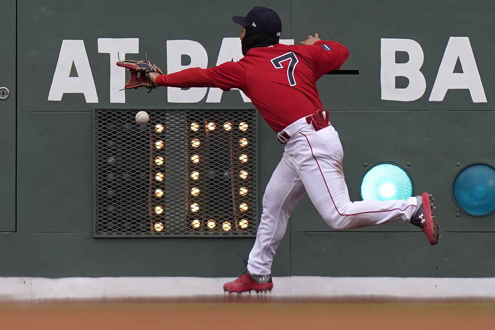 Boston Red Sox's Masataka Yoshida (7) tries to get his glove on a double hit by Pittsburgh Pirates' Bryan Reynolds in the sixth inning of a baseball game, Wednesday, April 5, 2023, in Boston.