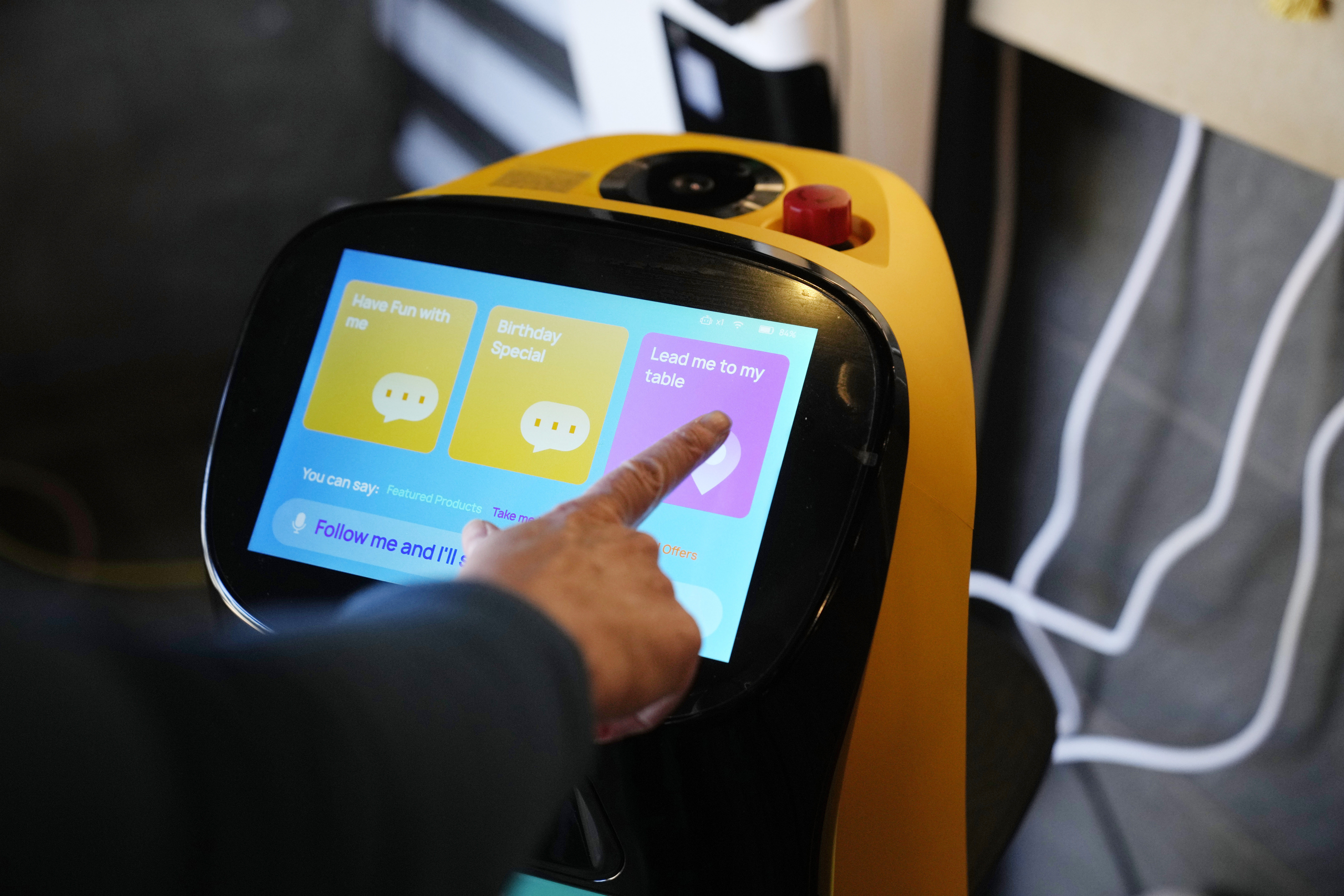 A BellaBot robot greets guests at the Noodle Topia restaurant on March 20 in Madison Heights, Mich. Many think robot waiters are the solution to the industry’s labor shortages and sales have been growing rapidly in recent years, with tens of thousands now gliding through dining rooms worldwide. 