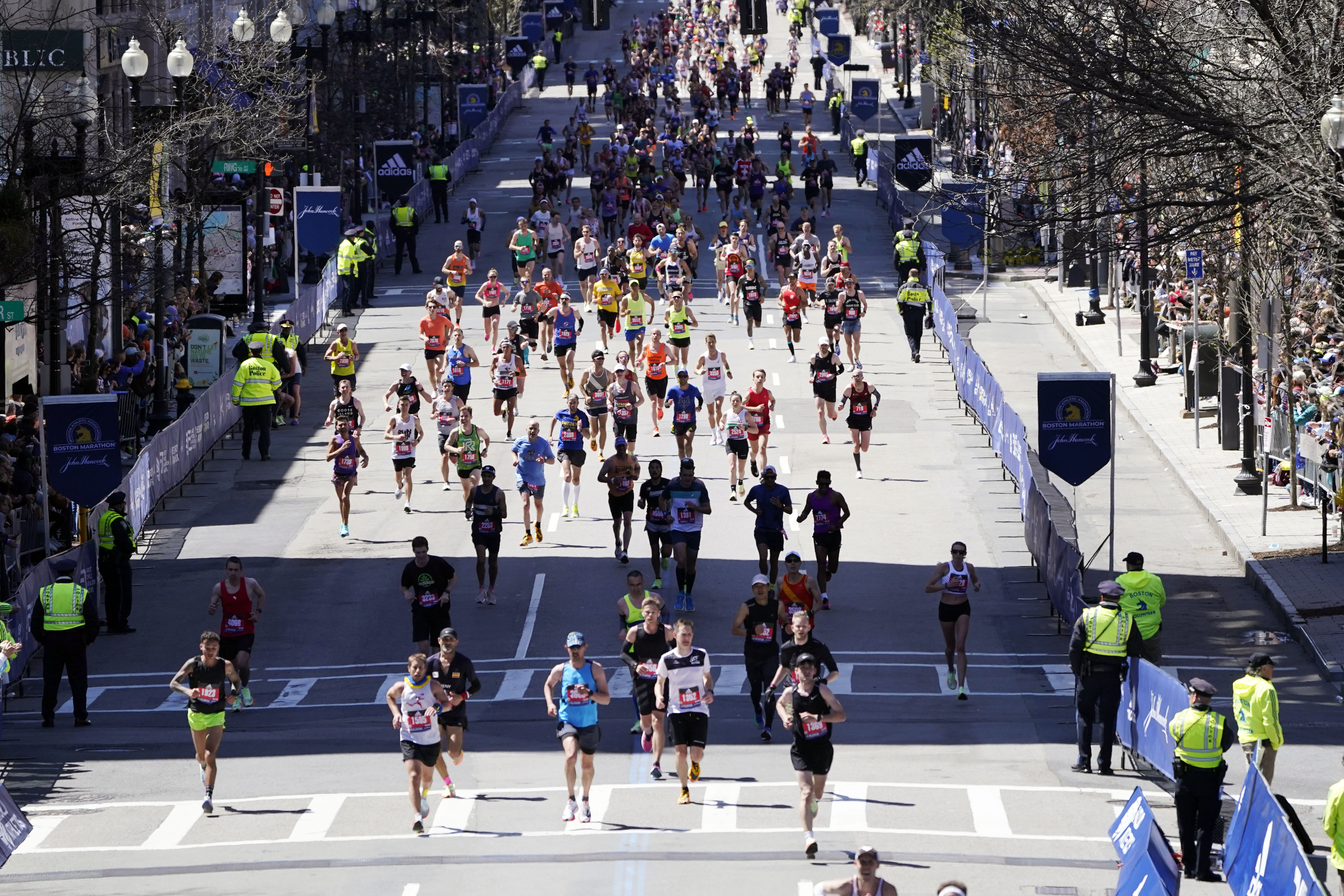 FILE - Runners approach the finish line of the Boston Marathon, Monday, April 18, 2022, in Boston. Massachusetts gambling regulators on Thursday, April 6, 2023, denied a request to allow legal betting on this year's Boston Marathon, citing opposition by the race's organizers as one reason. The state last month started allowing online sports wagering on pro sports and some college sports. 