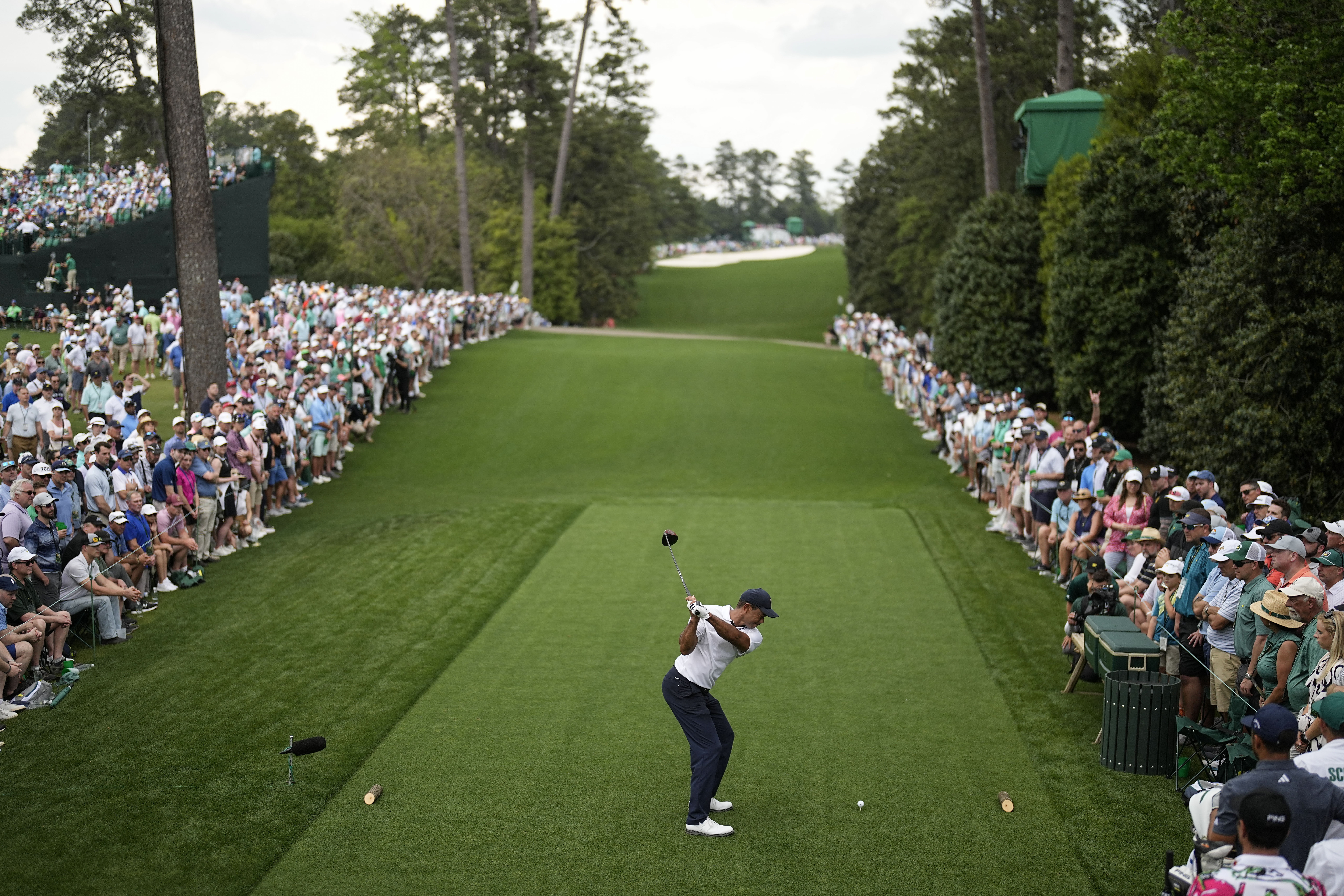 Tiger Woods hits his tee shot on the 18th hole during the first round of the Masters golf tournament at Augusta National Golf Club on Thursday, April 6, 2023, in Augusta, Ga. 