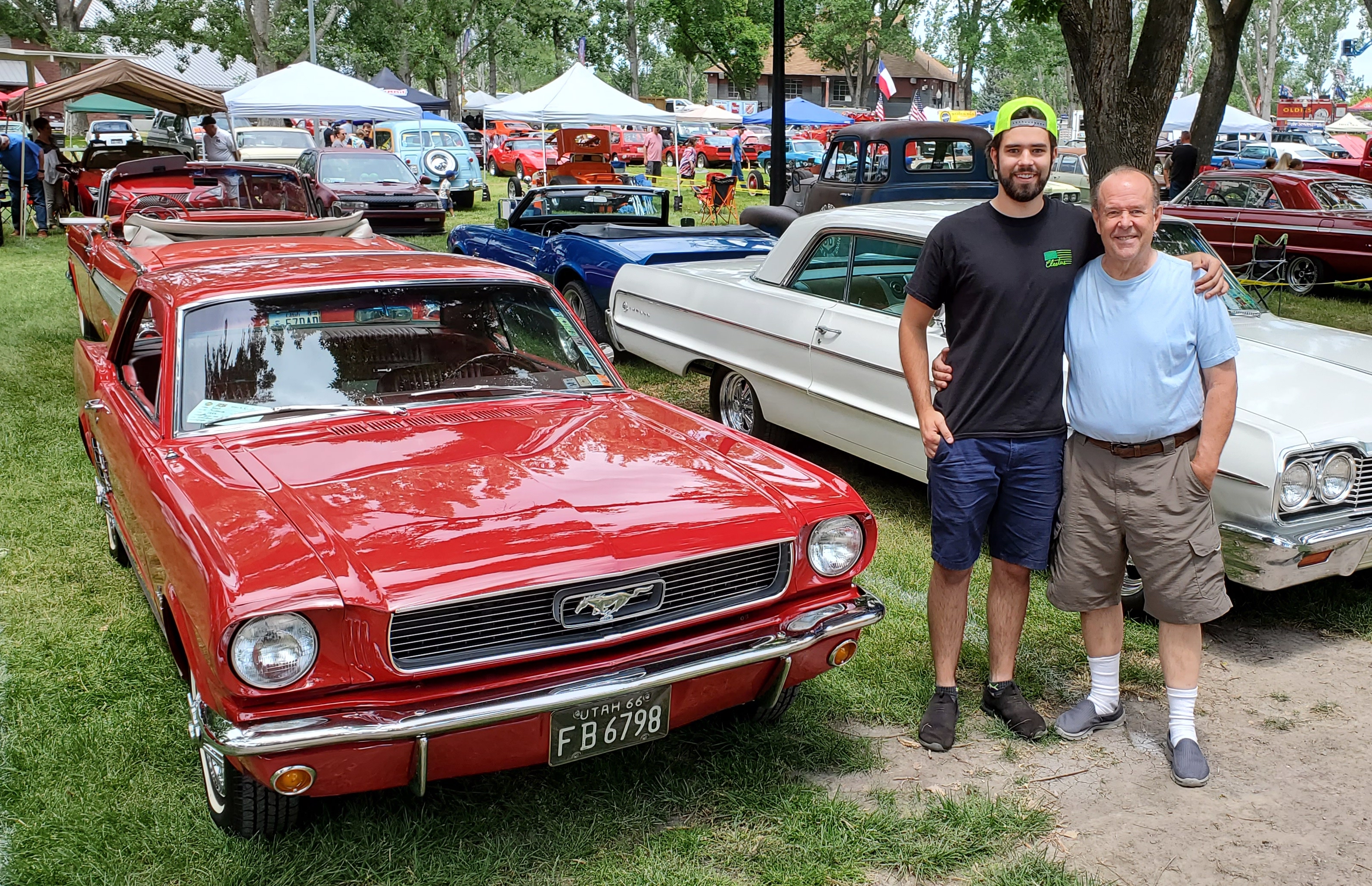 Carson Hoxer and his dad, Larry Hoxer, with their 1966 Ford Mustang at the Cache Valley Cruise-In, June 30, 2022, in Logan.