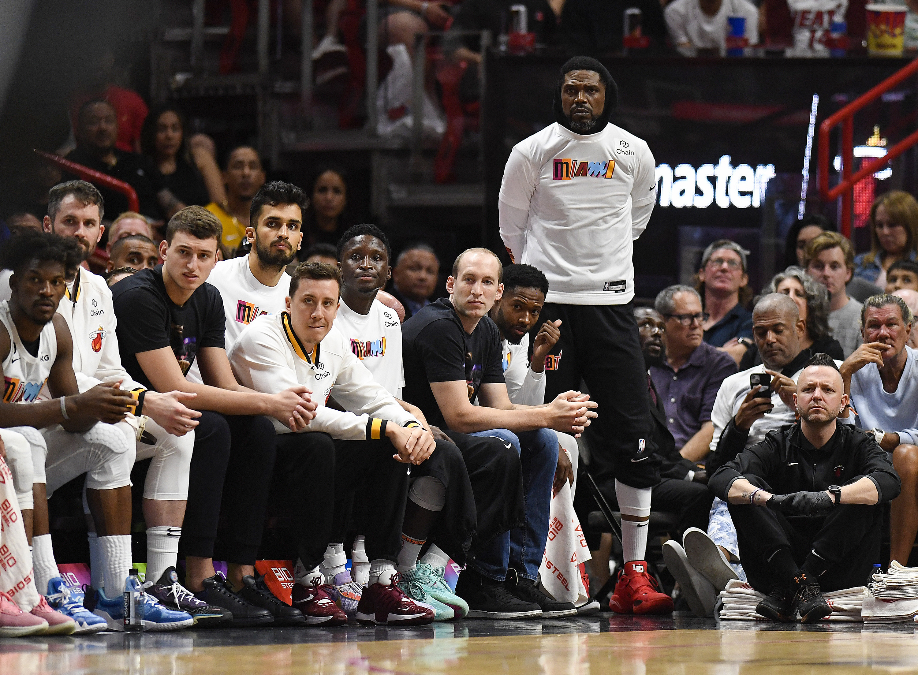 Miami Heat forward Udonis Haslem stands and watches his team play against the Brooklyn Nets during the second half of an NBA basketball game, Saturday, March 25, 2023, in Miami. 