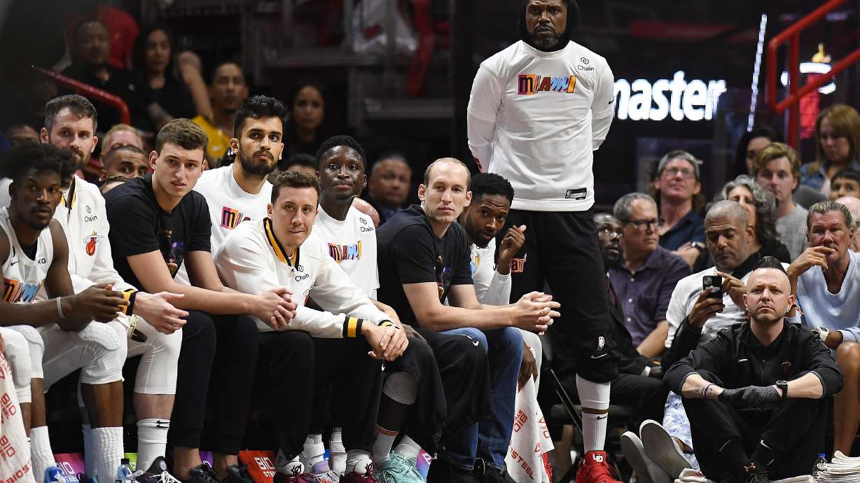 Miami Heat forward Udonis Haslem stands and watches his team play against the Brooklyn Nets during the second half of an NBA basketball game, Saturday, March 25, 2023, in Miami.